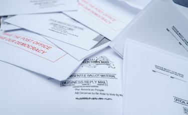 OpenGraph image for talkingpointsmemo.com/news/usps-quietly-added-rule-prohibiting-workers-from-signing-mail-in-ballots-as-witnesses