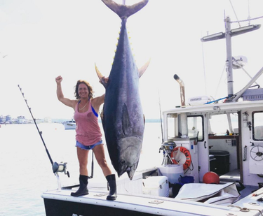 OpenGraph image for wokq.com/seabrook-new-hampshire-woman-reels-in-a-265-pound-tuna-on-her-first-solo-fishing-adventure/