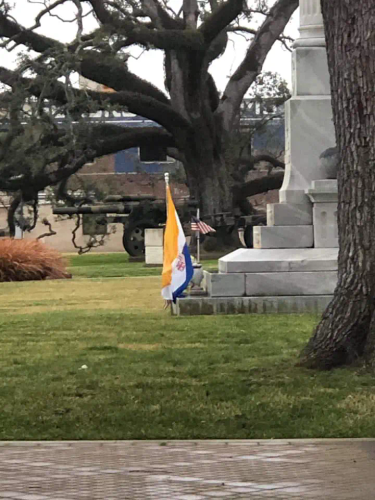 OpenGraph image for bigeasymagazine.com/2021/03/01/apartheid-flag-placed-at-destroyed-confederate-monument/?amp