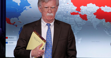 OpenGraph image for cbsnews.com/news/bolton-holds-legal-pad-with-5000-troops-to-colombia-written-on-it/