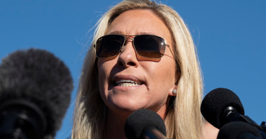 OpenGraph image for huffpost.com/entry/marjorie-taylor-greene-chases-alexandria-ocasio-cortez_n_609d2dd5e4b069dc48f7e4f4