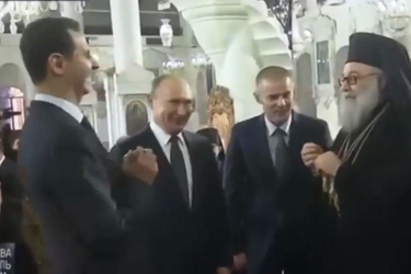 OpenGraph image for independent.co.uk/news/world/middle-east/putin-assad-trump-syria-russia-video-joke-mock-road-damascus-a9284466.html?amp