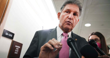 OpenGraph image for motherjones.com/politics/2021/11/in-the-middle-of-infrastructure-talks-joe-manchin-has-pursued-a-book-deal/