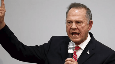 OpenGraph image for rawstory.com/2017/11/alabama-ex-cop-says-she-was-tasked-with-keeping-roy-moore-away-from-cheerleaders-at-high-school-games/