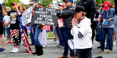 OpenGraph image for technologyreview.com/2020/05/21/1002105/covid-bot-twitter-accounts-push-to-reopen-america