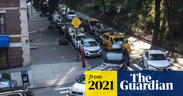 OpenGraph image for theguardian.com/environment/2021/nov/05/us-free-parking-spaces-climate-cost