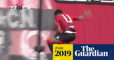 OpenGraph image for theguardian.com/sport/video/2019/mar/10/goal-celebration-goes-wrong-as-j-league-striker-misjudges-drop-behind-advertising-board-video