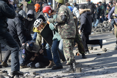 OpenGraph image for vice.com/en_us/article/z3eq89/a-trump-ad-used-a-photo-of-protesters-beating-up-a-cop-in-ukraine-6-years-ago