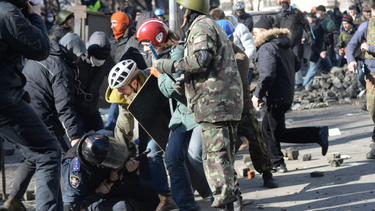 OpenGraph image for vice.com/en_us/article/z3eq89/a-trump-ad-used-a-photo-of-protesters-beating-up-a-cop-in-ukraine-6-years-ago