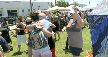 OpenGraph image for wtkr.com/news/impact-of-hugs-group-of-moms-give-out-hugs-to-lgbtq-members-rejected-by-their-parents
